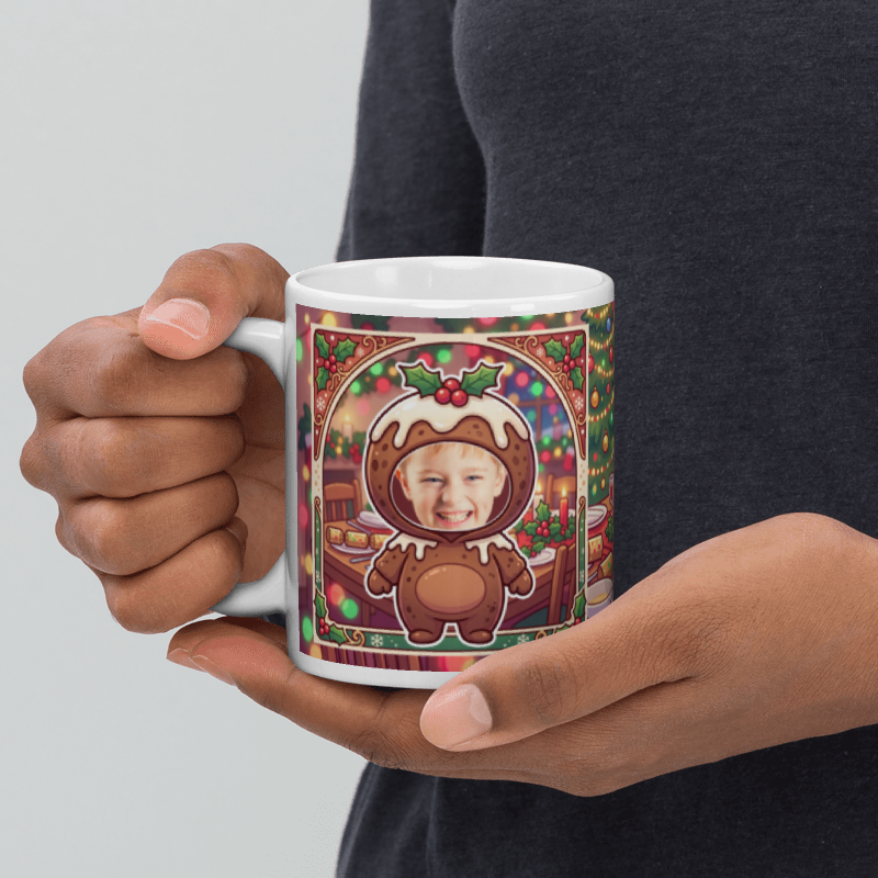 Christmas pudding photo mug held in a hand to show the size
