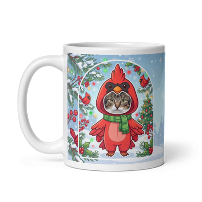 The same cat cardinal mug with the handle on the left, the cat's face still showing