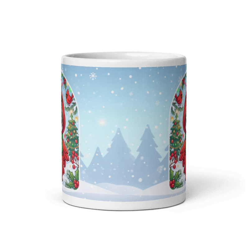 Back of the cat cardinal mug showing a pale blue winter scene with snowy pine trees