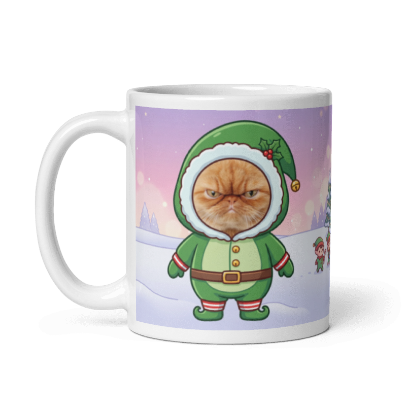 The same cat elf mug with the handle on the left, the cat's face still showing