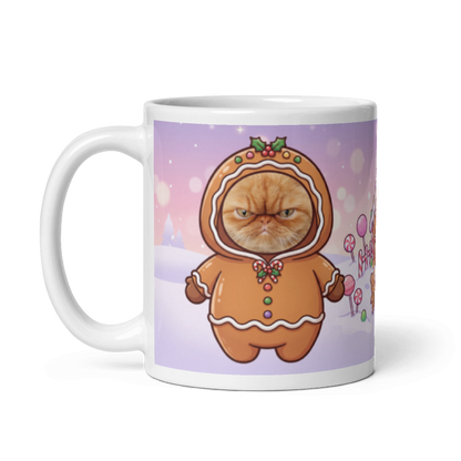 The same cat gingerbread mug with the handle on the left, the cat's face still showing