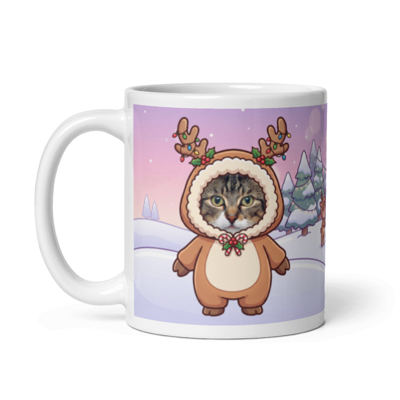The same cat reindeer mug with the handle on the left, the cat's face still showing