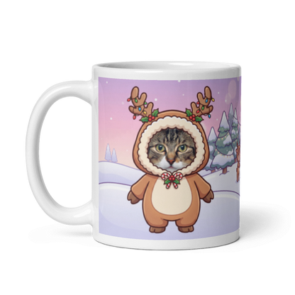 The same cat reindeer mug with the handle on the left, the cat's face still showing