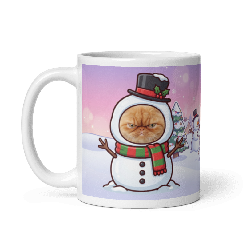 The same cat snowman mug with the handle on the left, the cat's face still showing