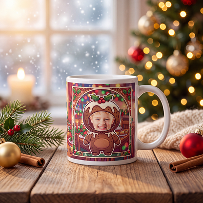 Personalized Christmas pudding mug on a wooden table with a lit Christmas tree and gifts behind