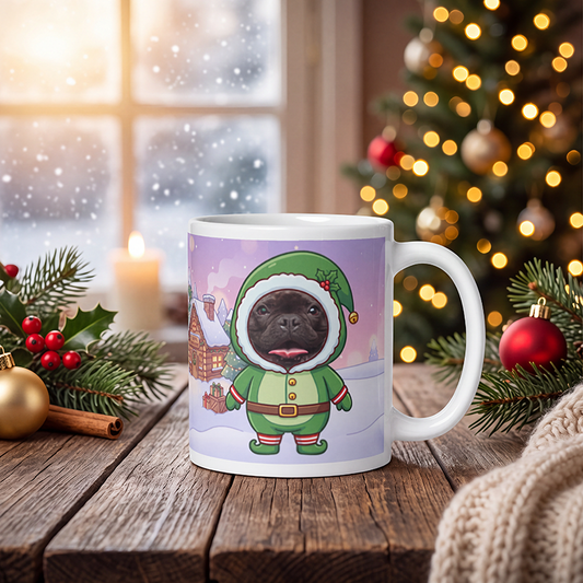 Personalized dog elf mug with a dog's face, on a wooden table with a lit Christmas tree and a frosted window behind